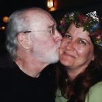 George kissing his daughter, Kelly