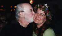 George kissing his daughter, Kelly